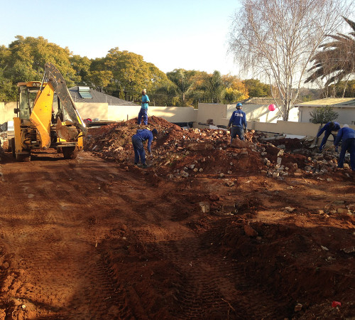 Blending the soil with the crushed up rubble Placed in layers and then compacted